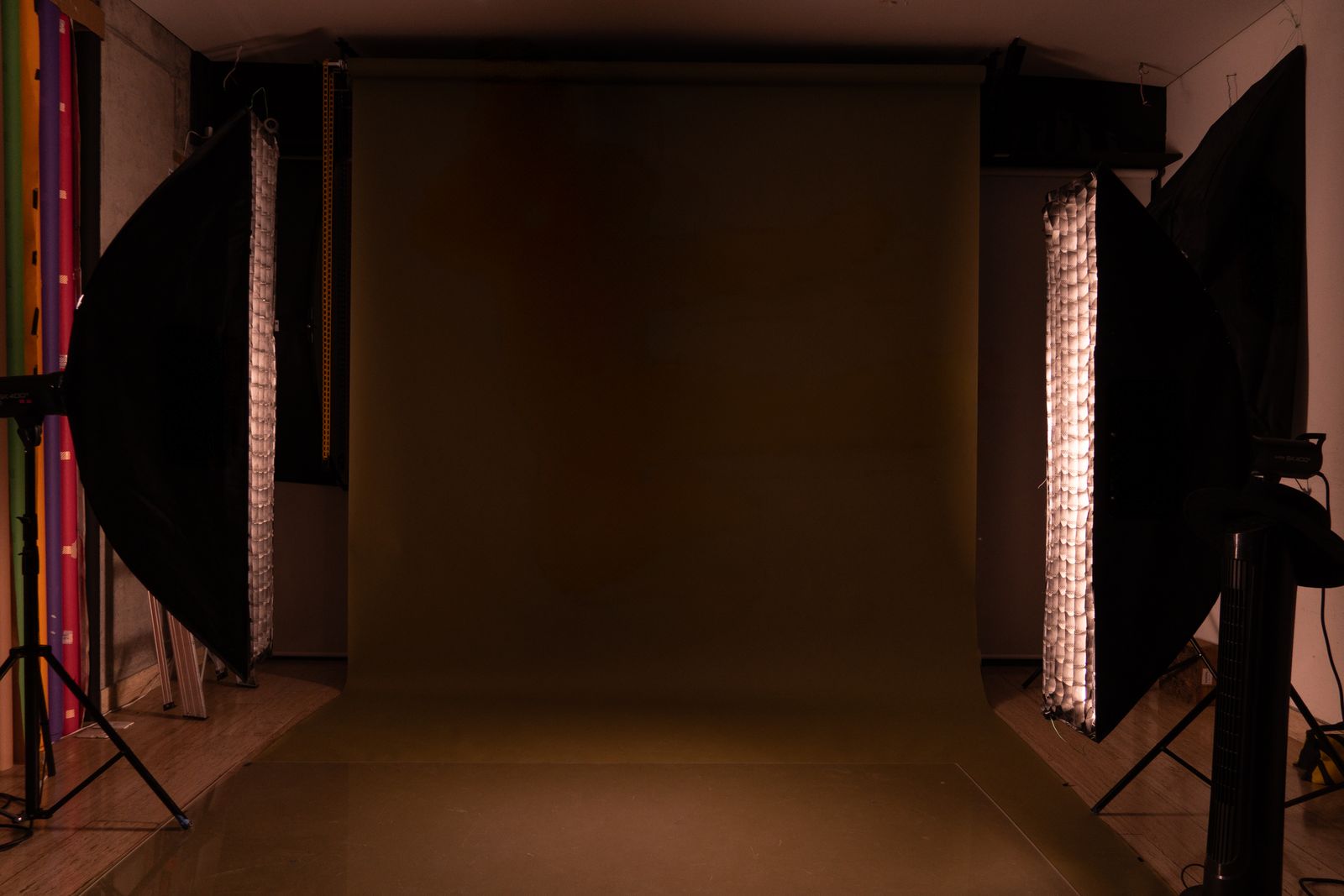 Rim-lit softbox detail in the blackout studio